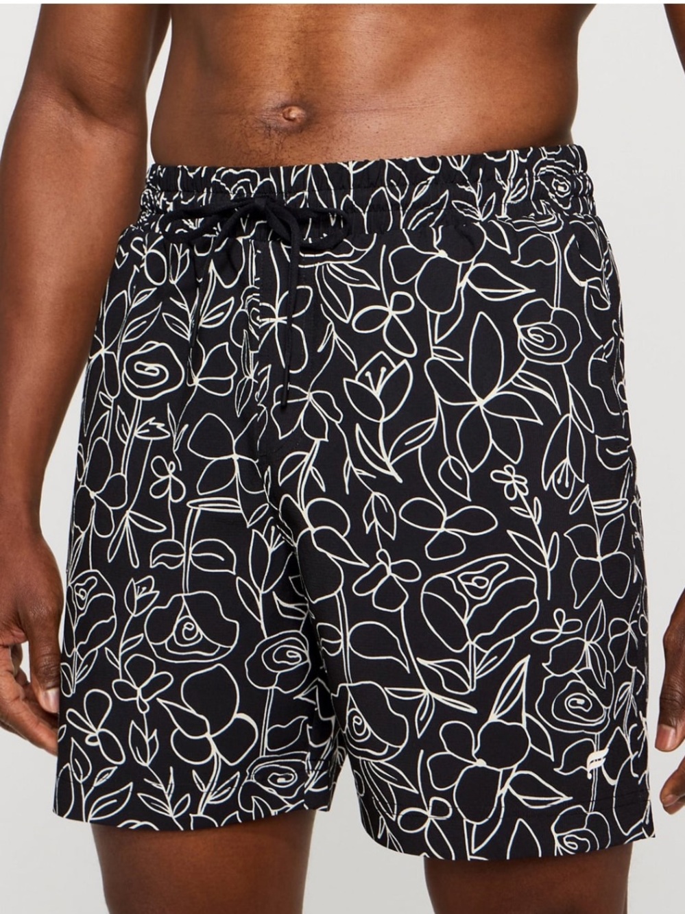 Fabletics The Cabana Black Swim Trunks with White Floral Line Print